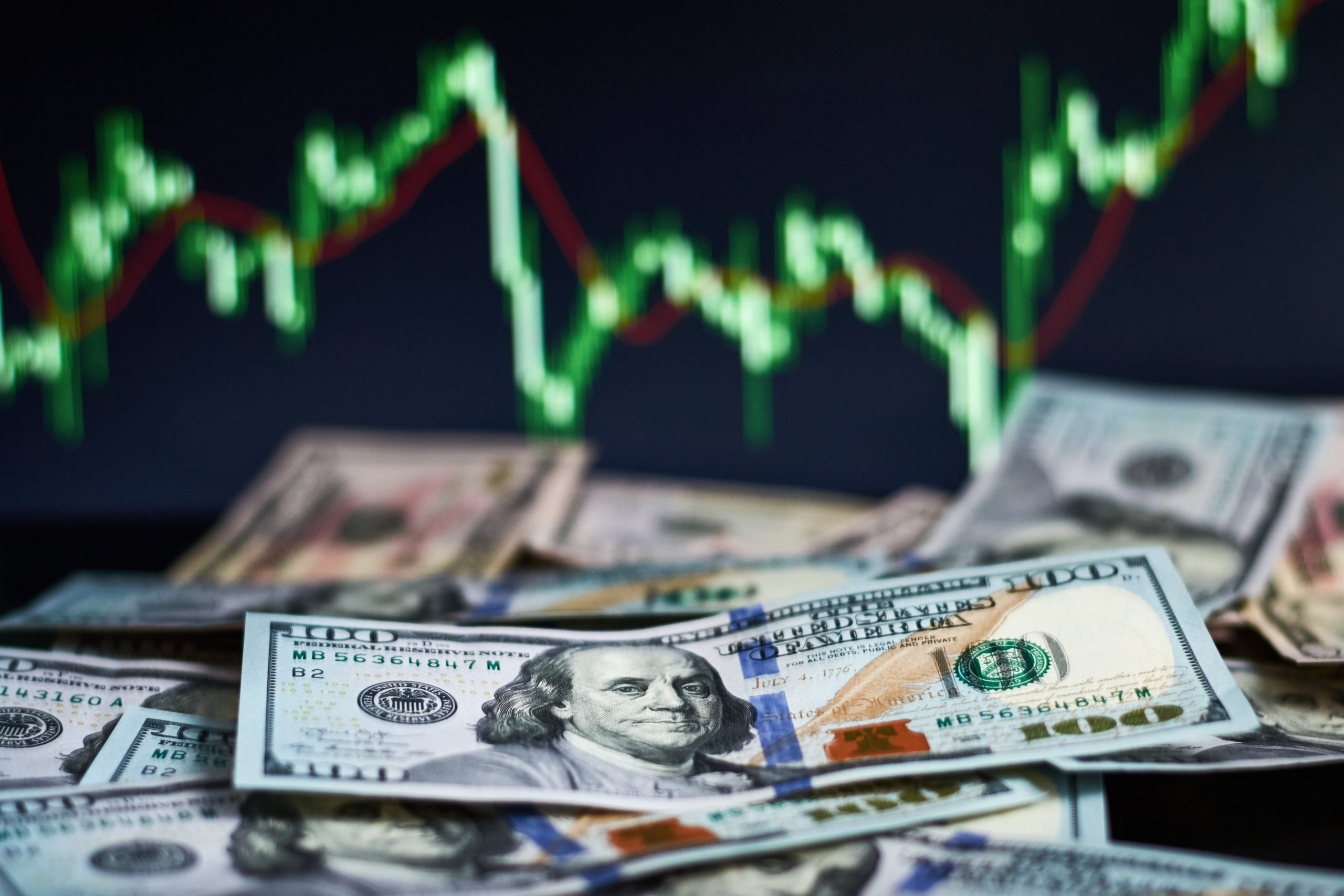 100 dollar bills showing its strength